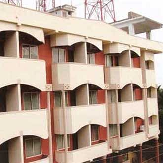 Woodside Hotel Mangalore Bagian luar foto