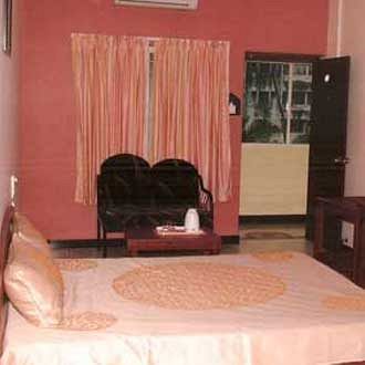 Woodside Hotel Mangalore Bagian luar foto