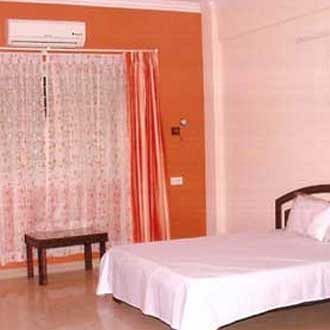Woodside Hotel Mangalore Bagian luar foto