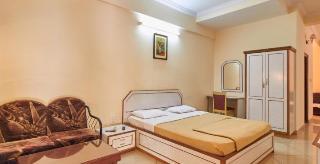 Woodside Hotel Mangalore Bagian luar foto