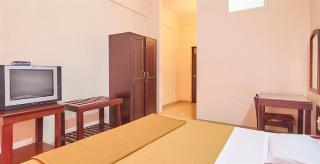 Woodside Hotel Mangalore Bagian luar foto