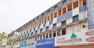 Woodside Hotel Mangalore Bagian luar foto
